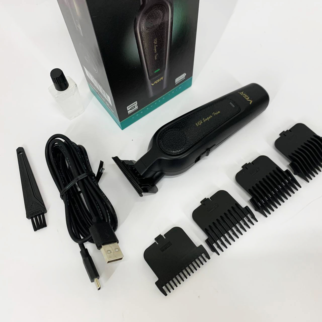 Акумуляторна машинка для стрижки VGR V-995 з 4 насадками 2000 мАг USB - Зображення 3
