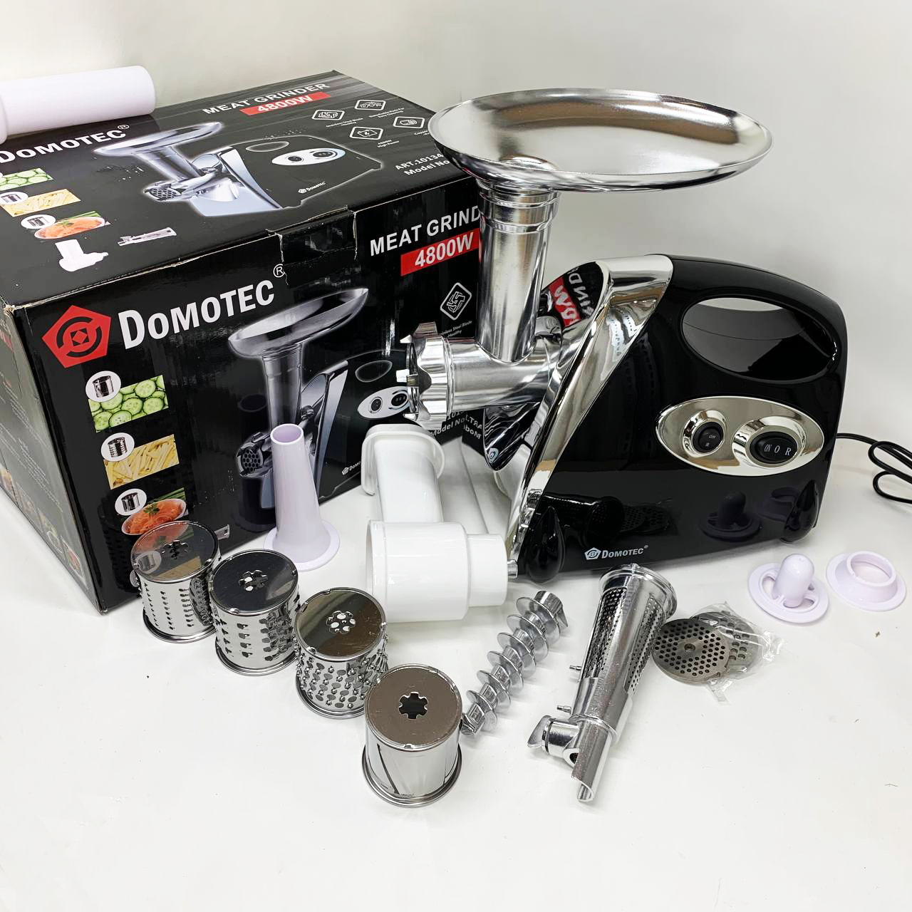 М'ясорубка електрична DOMOTEC MS-2025 3 в 1 4800 Вт із соковижималкою, терками, шатківниками та реверсом - Зображення 3